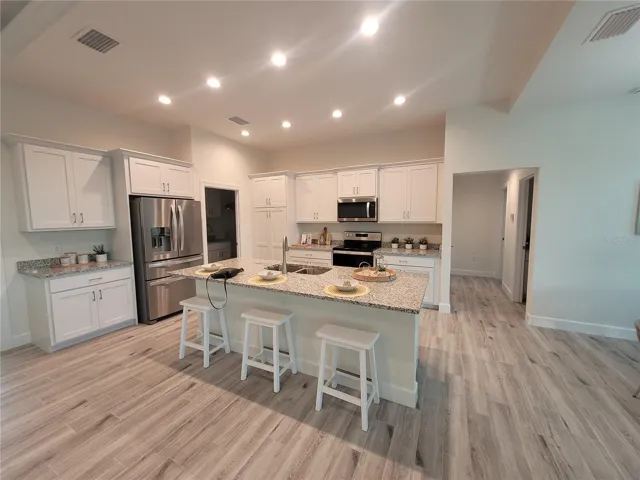 Photos are from a similar finished house