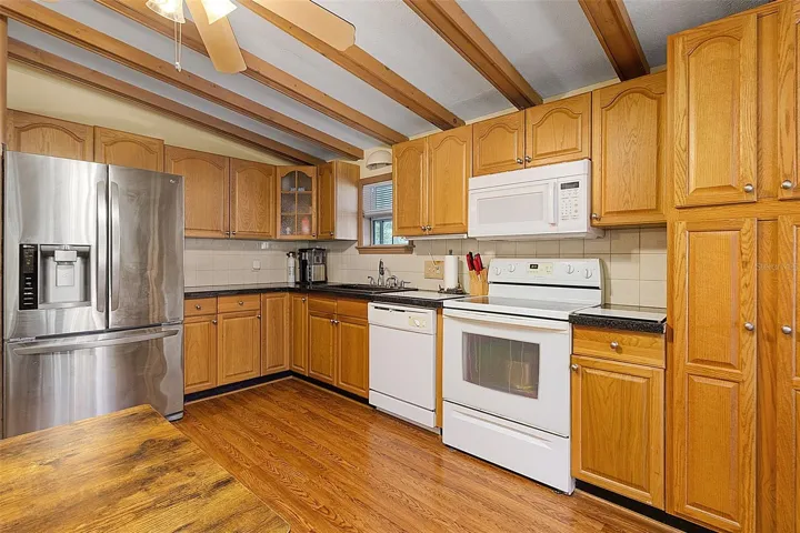 Kitchen with High Beam Ceiling