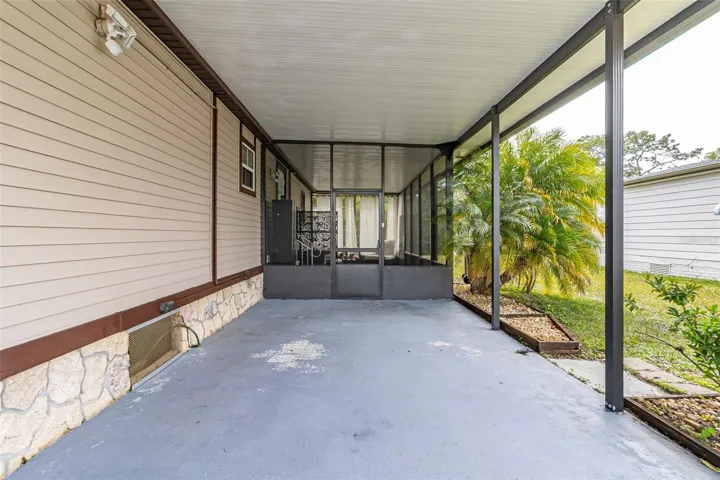 Enclosed Screen Porch with Carport