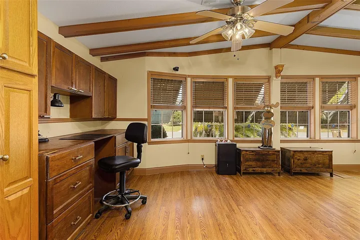 Spacious Living Room with High Beam Ceiling