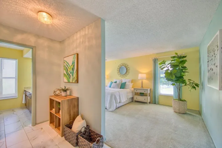 Master suite dressing area with walk-in closet ~