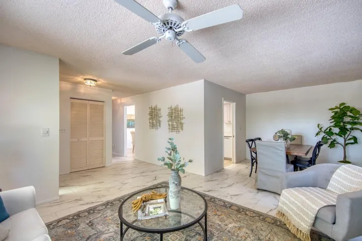 Foyer, living room & dining room to kitchen perspective~