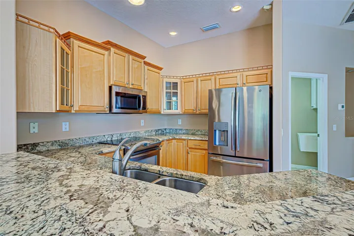 Granite counter tops with wood cabinets