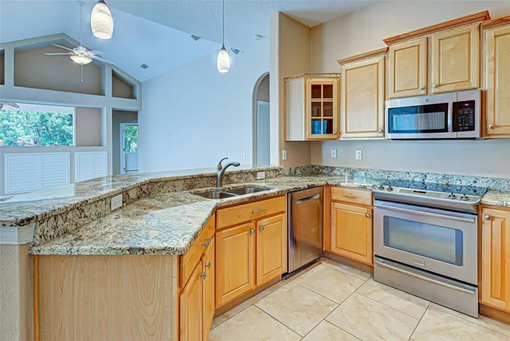 Granite counter tops with wood cabinets