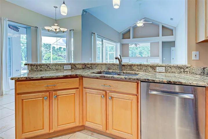 Granite counter tops with wood cabinets