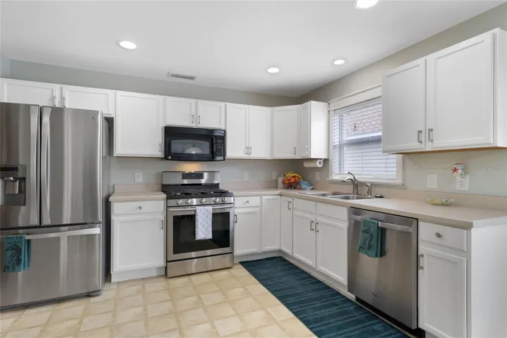 Kitchen features Recessed Lighting and updated Gas Range, Dishwasher & Refrigerator