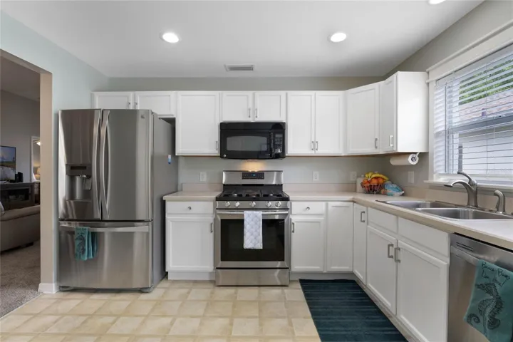 White Cabinetry and Brush Nickel Hardware