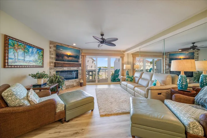 Family Room with Luxury Vinyl Plank flooring and view of the Intracoastal Waterway.