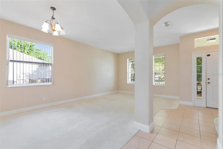 Arched entryways add a modern flair to these spaces.