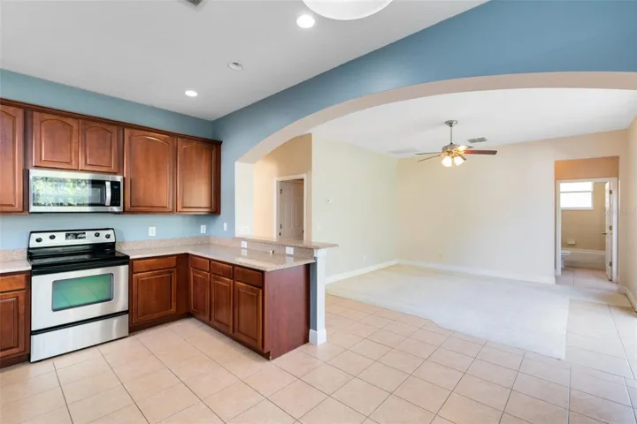 A view from the kitchen into the family room.