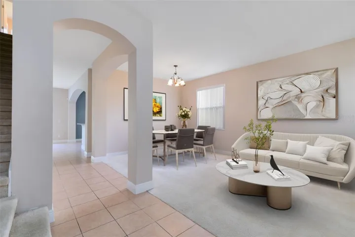 This photo has been virtually staged. You'll love elegance of a formal living room and dining room combination.