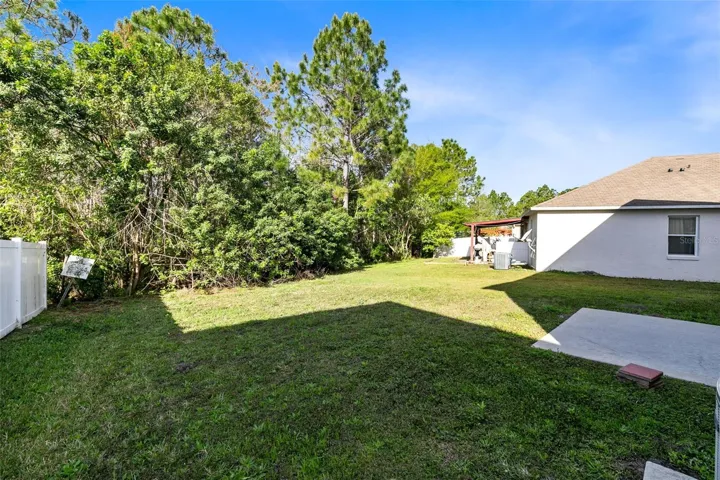 Nice sized backyard perfect for a firepit, garden or pool!
