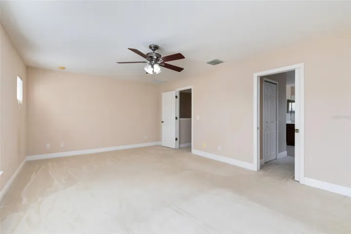 Relax at the end of the day in your beautiful master bedroom.