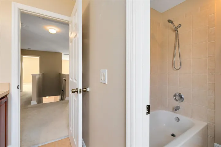 Second floor full bath with a tub/shower combo.