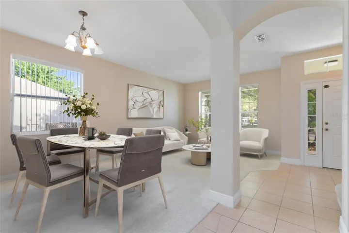 This photo has been virtually staged. Arched entryways add a modern flair to these spaces.