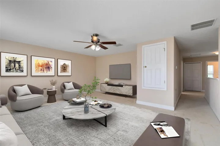 This photo has been virtually staged. Escape to the large bonus room on the second floor.