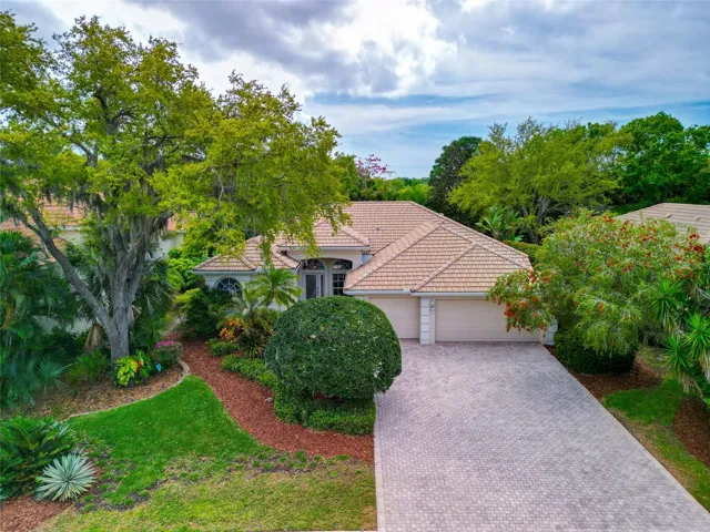Long paver drive & 3 car garage