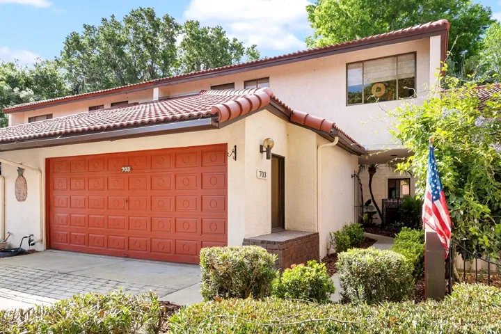 Front Exterior with Lush Landscaping
