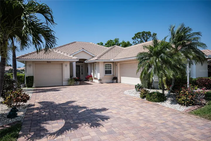 Welcome to 7071 South Lake Drive in Oyster Creek Golf and Country Club