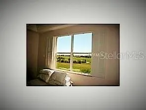 Owner's Suite With Plantation Shutters Overlooking Golf Course