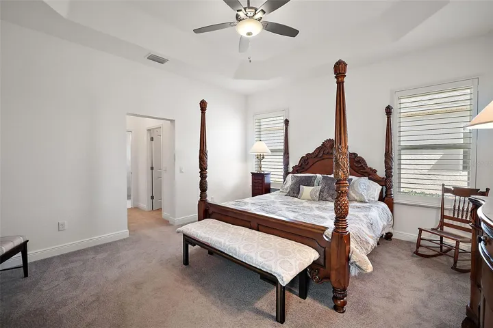 Primary bedroom with 2 walk in closets