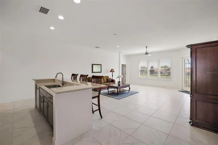 Breakfast bar and living room