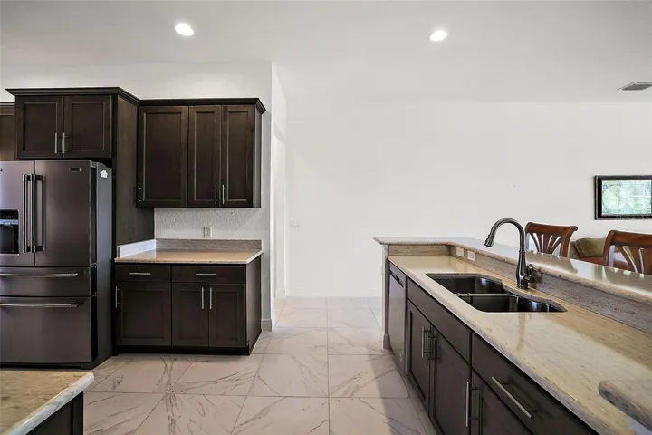 Stainless kitchen sink in the center island