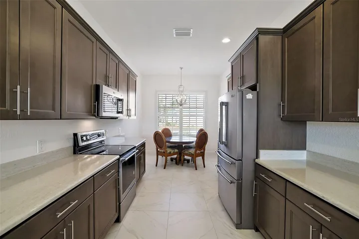 Wood cabinets with solid surface counters