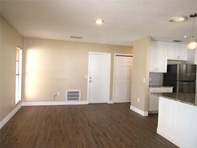 Lot's Of Space In This Bright and Cheerful Dining Room--Open From Kitchen!