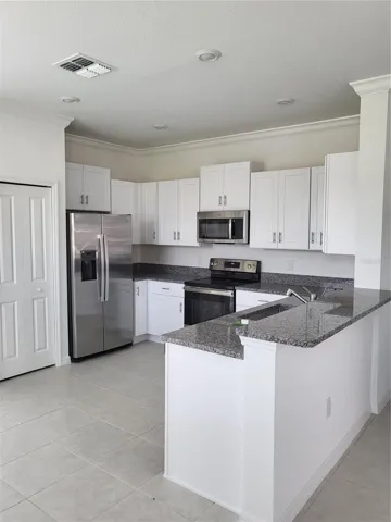 KITCHEN FROM GREAT ROOM