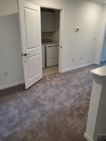 LOFT AREA AND HALLWAY TO 2ND BEDROOM