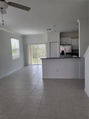KITCHEN AND DINETTE FROM GREAT ROOM
