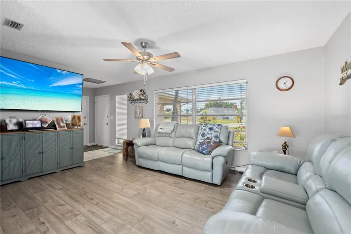 Living Room with luxury vinyl flooring view 1