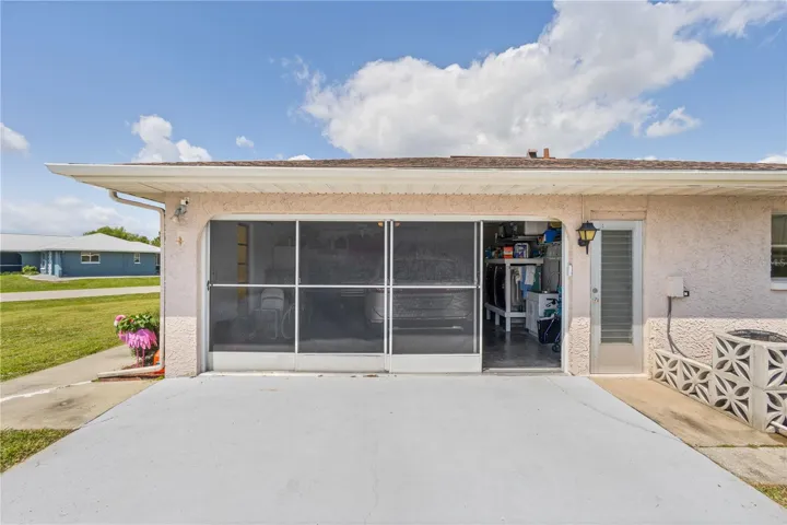 side garage view with screen