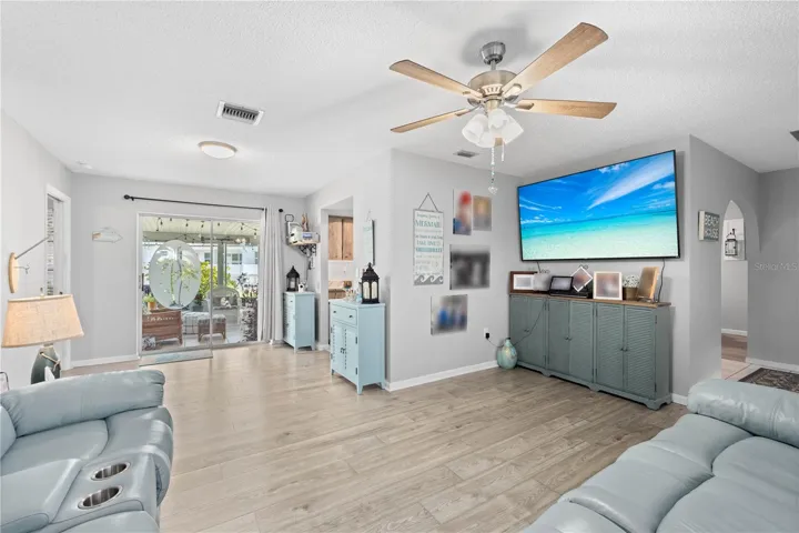 Living Dining room combo with sliders to the Florida Room