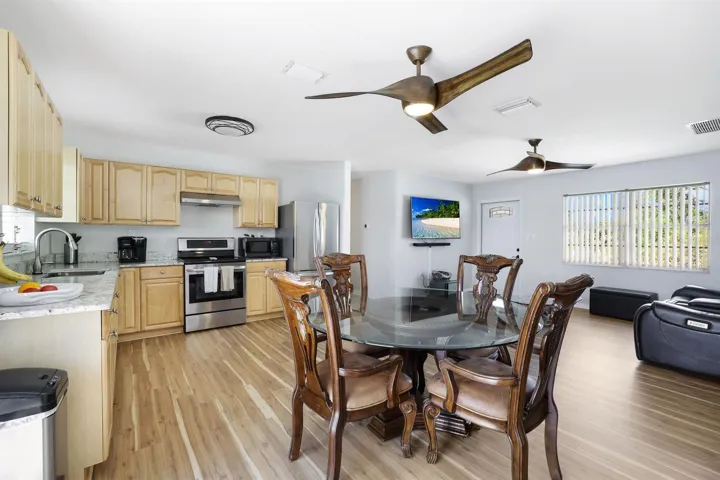 New Luxury Vinyl Plank Flooring throughout the home, including the bedrooms.