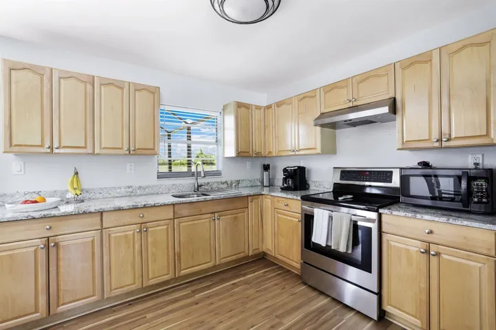 Open Kitchen with beautiful granite countertops