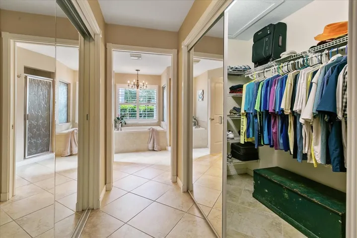 Primary Suite - features 1 walk-in and 1 large double-door closet