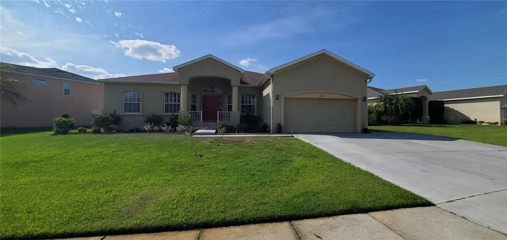 Beautiful home. great curb appeal.  extended driveway to permit side by side parking for three automobiles and two cars in the garage.  The front porch is four steps high and the landing is under truss.