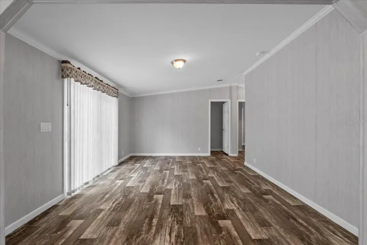 Family Room w/ Sliding Glass Door to Backyard