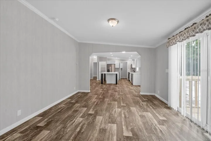Family Room with View of Dinette & Kitchen