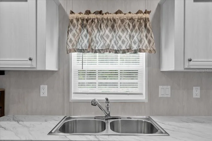 Kitchen Sink w/ window to Backyard