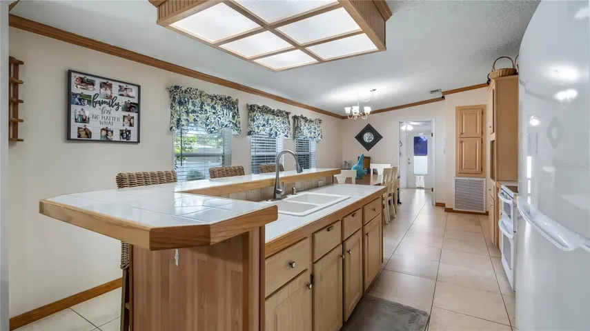 Large kitchen with breakfast bar