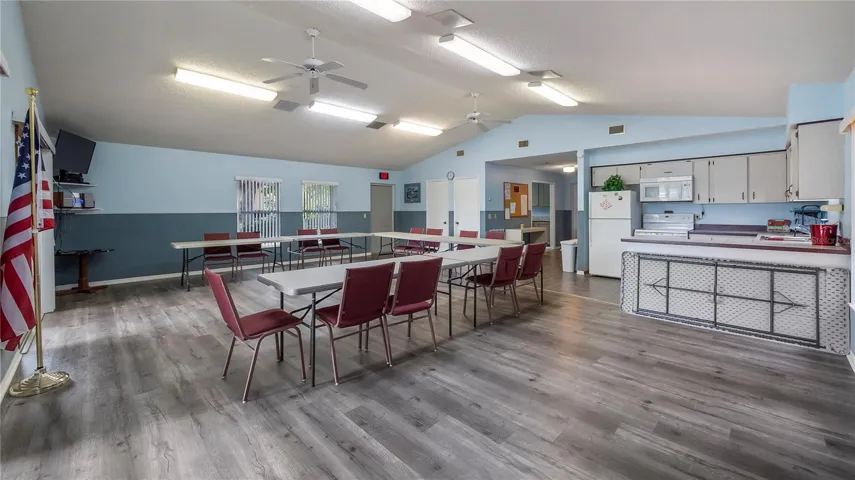 Community building 3 doors north. Great place for meetings and gatherings. Paved parking lot and boat ramp