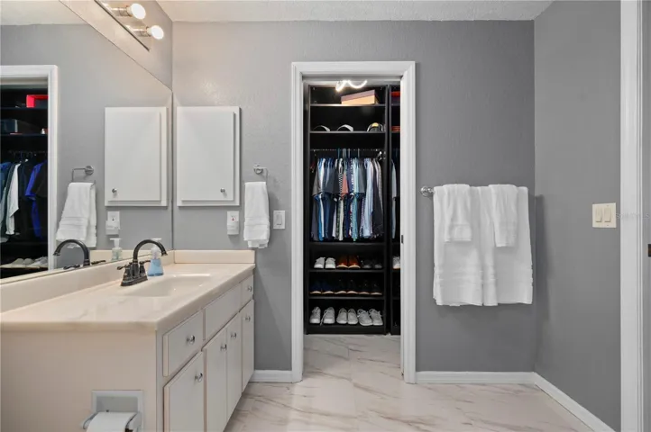 Primary Bath and walk in closet.