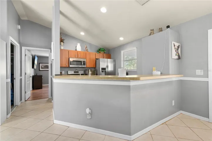Kitchen and primary bedroom.