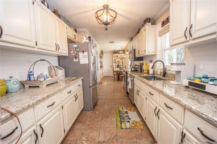 Kitchen looking back to Laundry/ dining