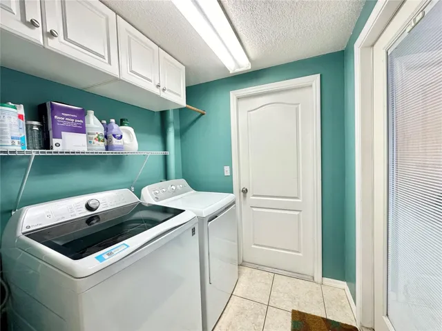Laundry room and door leading to the garage