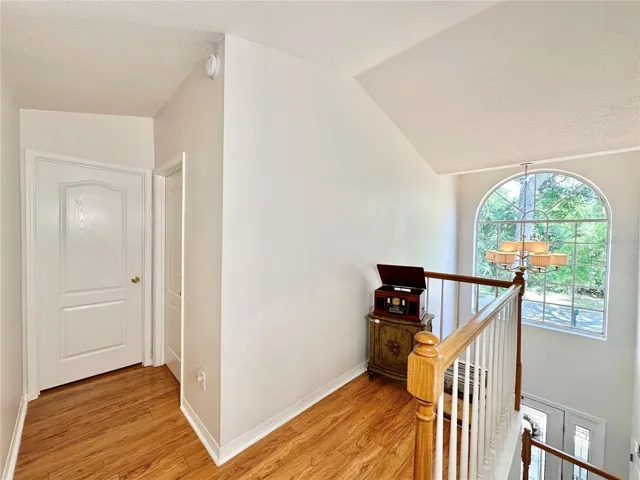 Stairway and balcony leading to guest bedroom 2 and guest bathroom