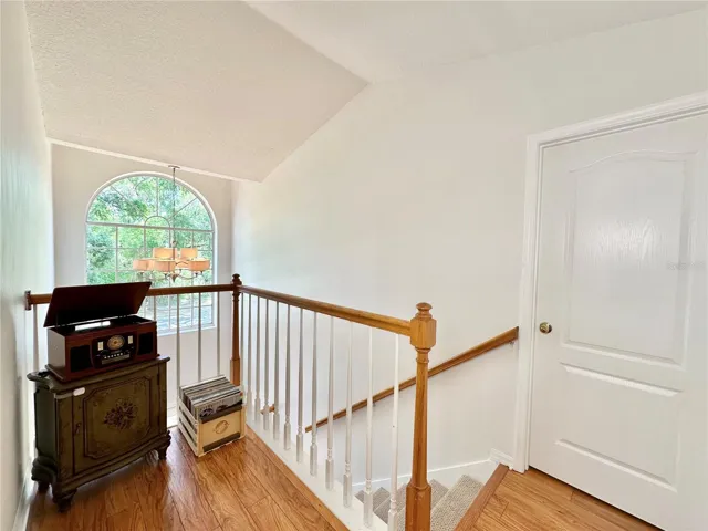 Stairway and balcony leading to guest bedroom 1
